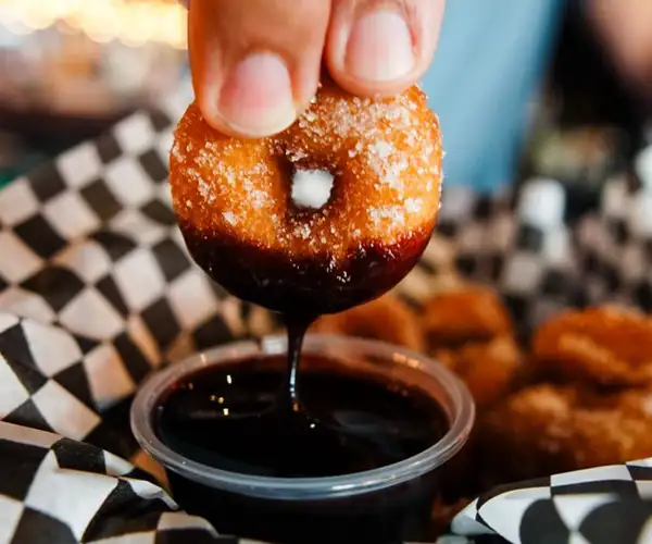 Mini donuts with dipping sauce at The Lobby Kitchen & Bar